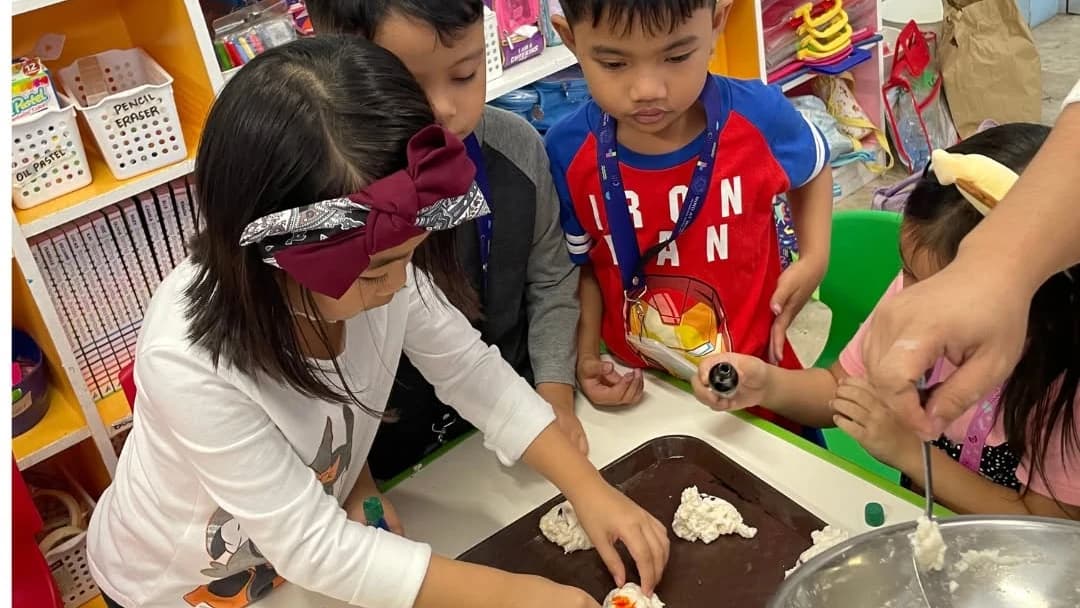 Preschool children working together on a shared project